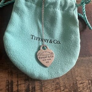 Please return to tiffany heart pendant with 18 inches chain